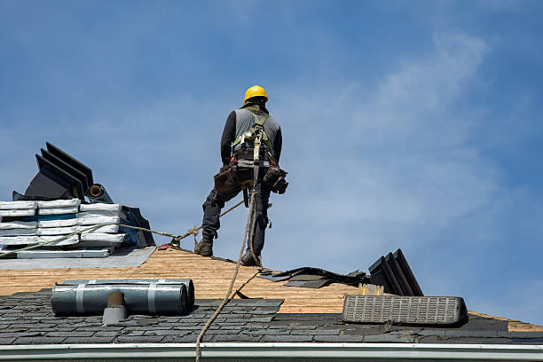 Professional Gutter Installation technician working in Freeport, NY